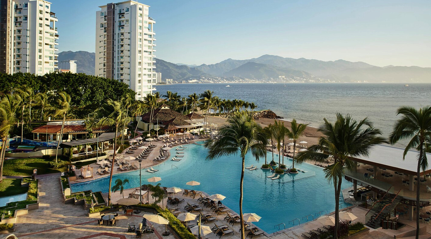 Marriott Puerto Vallarta Resort and Spa beachfront property with pools, palm trees, and oceanview rooms on the Marina Vallarta coast.