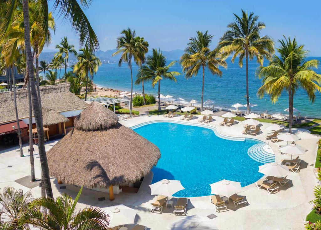 Plaza Pelicanos Grand Beach Resort all-inclusive hotel in Puerto Vallarta with beachfront location, pools, and ocean views on Banderas Bay.