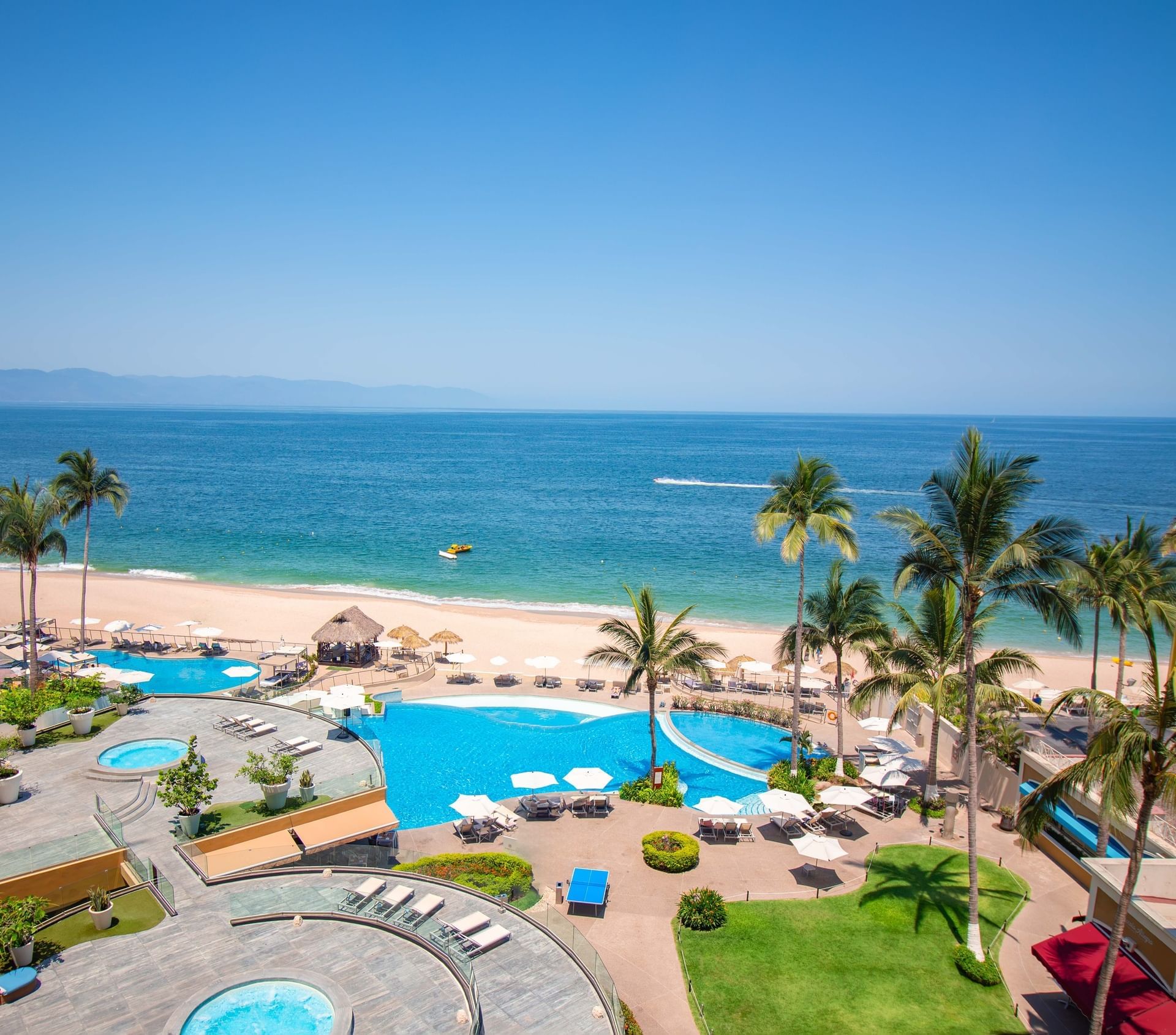 Sunset Plaza Beach Resort & Spa beachfront hotel with ocean views and pools in Puerto Vallarta's Hotel Zone.